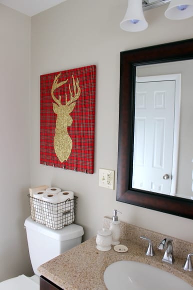 The reindeer silhouette wall art is festive for the holidays. 
