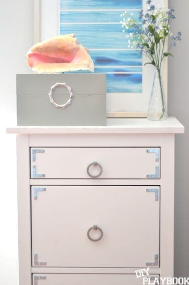 I love the way the silver accents make the plain white IKEA Hemnes dresser really pop!