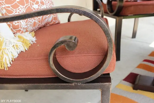 The detail on these patio chairs is antique looking. 