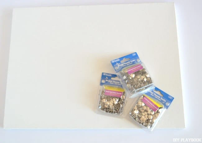 My DIY Thumb Tack Art only required two supplies! A blank canvas and some thumb tacks! | DIY Playbook