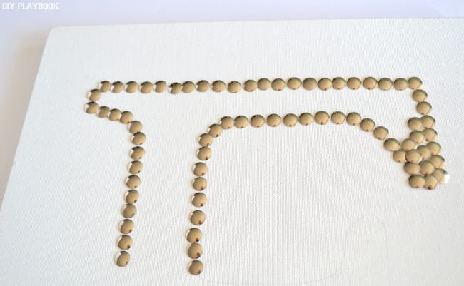 After I traced the "F" I started outlining the letter with the tacks! SImple as that. 