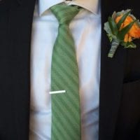 Small details from the Finn weddings; green ties and orange flowers