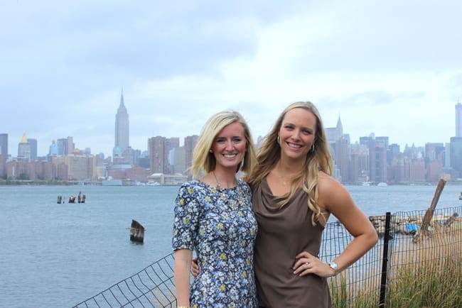 Bridget and Casey of DIY Playbook pose in front of the NYC skyline. 