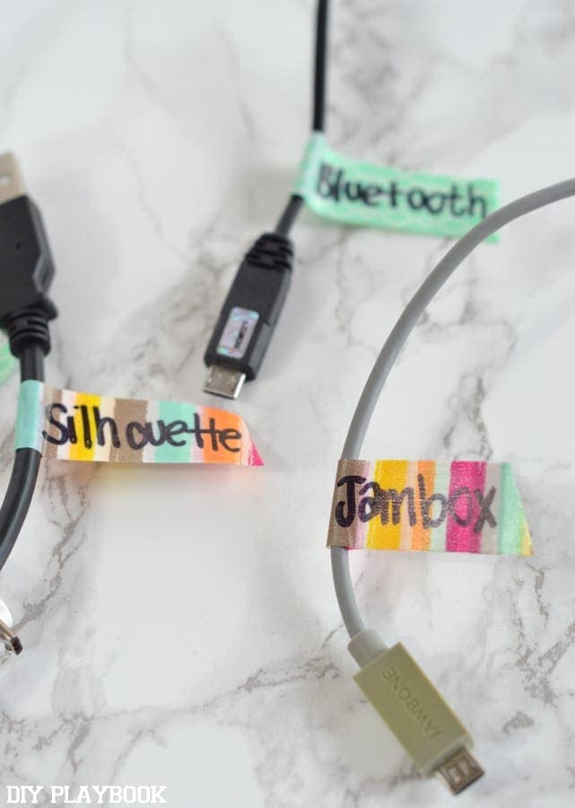 Label each cord using washi tape. 