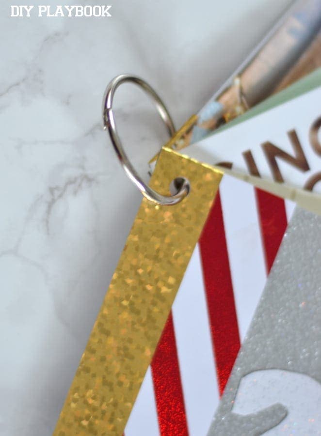 Bundle & secure your old Christmas cards with an inexpensive metal ring. 