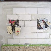 When installing new kitchen backsplash, ensure all outlets and switches are taken care of.
