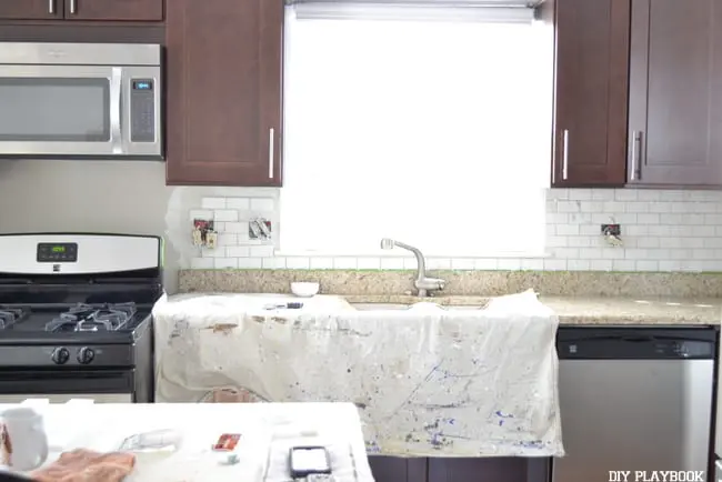 Installing your own new kitchen backsplash is easier than you think. 