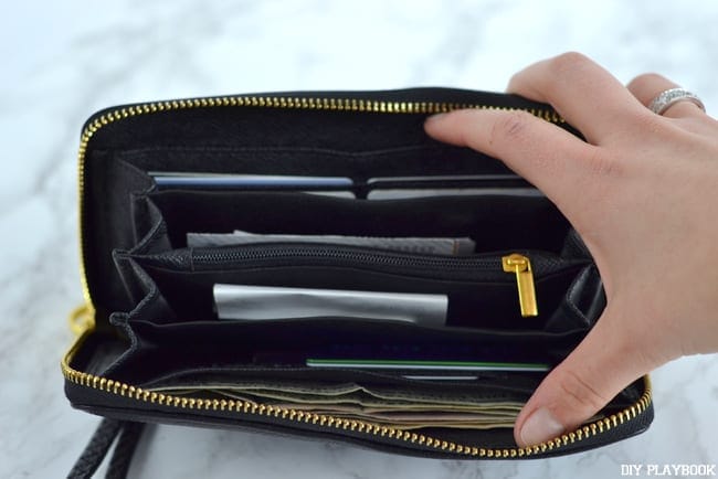 A wallet with compartments helps to keep you organized