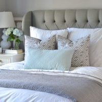 The neutral tones in this bedding pair well with the gray walls.