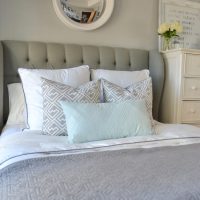 The gray headboard works great with the various pillows.