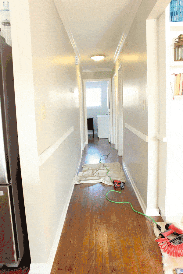 Creating a board and batten hallway like this one is simple a step-by-step tutorial. 