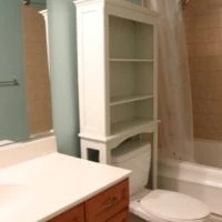 This bathroom has a lot of storage.