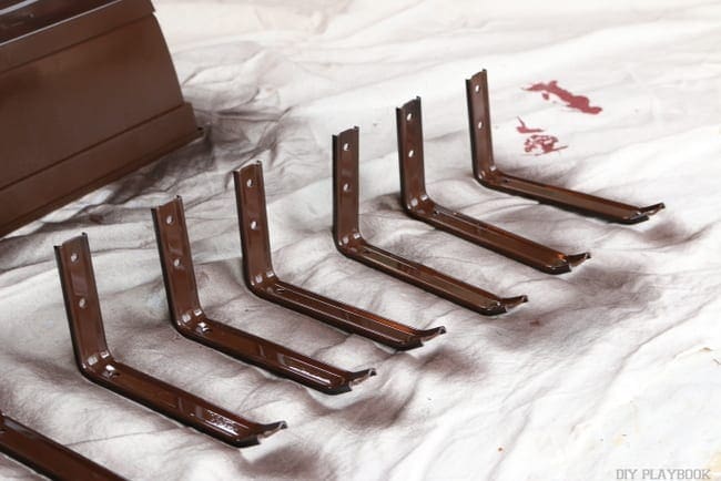 Spray paint each of the brackets brown as well. 