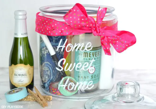 This DIY housewarming gift is really cute and also useful, which is the best kind of gift. You just fill a large jar with things everyone can use in a new place!