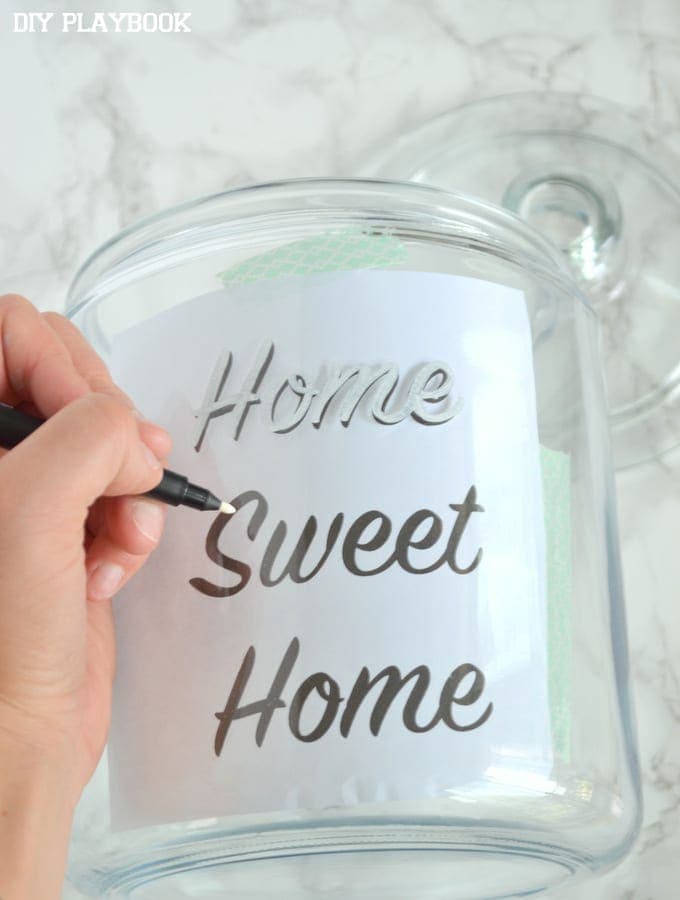 Use tracing paper to write the words "home sweet home" on the jar so they look picture perfect!
