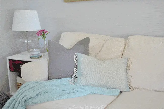 Add throw pillows and a blanket for a warm, cozy feel!