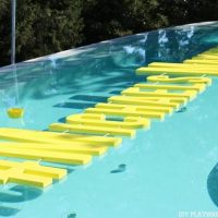 These letter pool floaties are fun decor pieces.