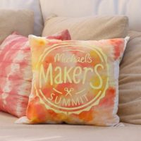 This DIY pillow is cute and colorful on the couch.