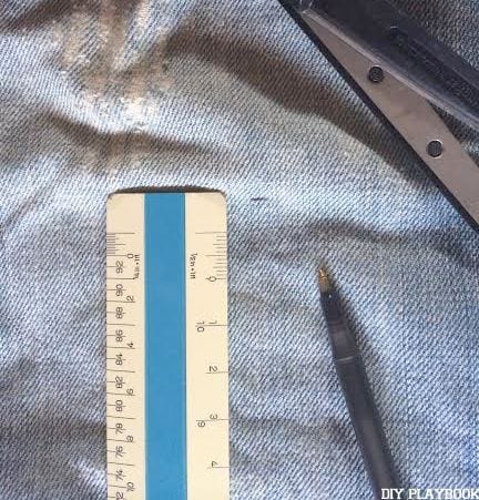 Measure your jeans for your DIY jean shorts.