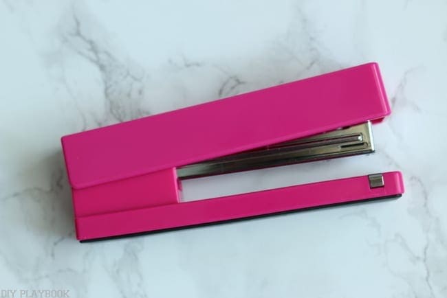 This plain pink stapler can be easily personalized with a paint pen