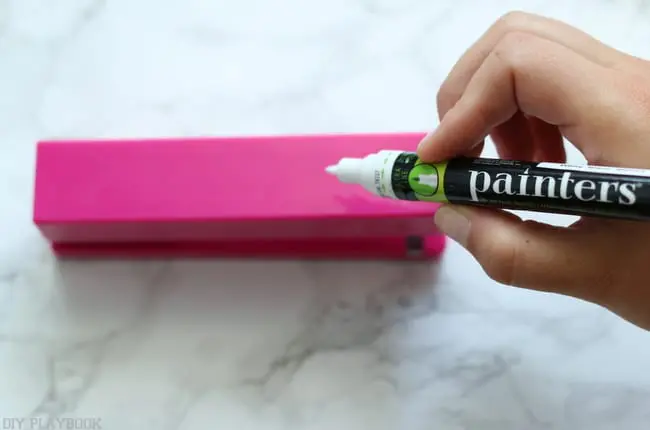 Decorate a stapler however you like with a paint pen