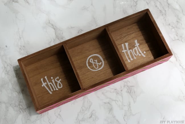 This divided wooden tray is customized with a paint pen to give it a fun touch