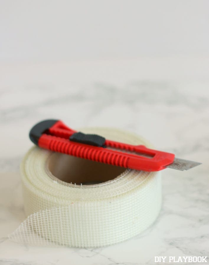 Joint tape and a razor are two important supplies to use when patching holes in a wall. | DIY Playbook