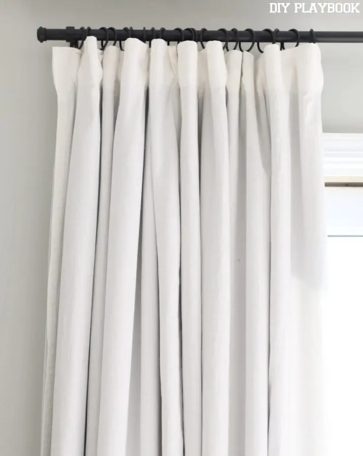 Casey's Ikea curtains are a neutral tone so they don't take away from the rest of the room. 