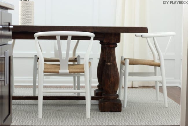 Theses low-back dining chairs look great with this dark table. 