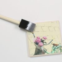Apply the photo to the tile coaster and let set.