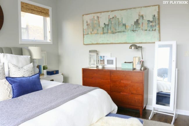 Casey has some very cool details in her master bedroom, like her full length stand alone mirror and a beautiful print of the Chicago skyline. Find out where she got everything in this master bedroom source list post!