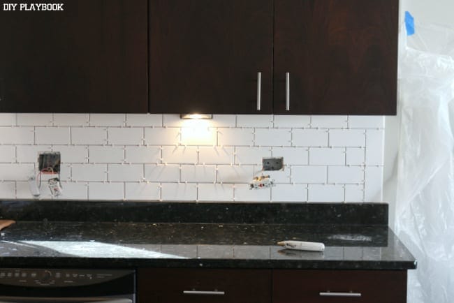 Here's the tile up on the wall, drying and waiting for the grout to be applied. | DIY Playbook