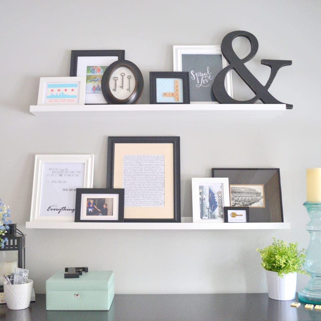 If commitment isn't your thing, photo ledges allow you to change out frames and other items you want to display