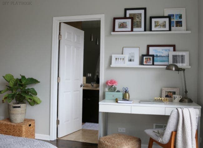 We love this corner of Casey's bedroom, including the desk, plant and wicker plant stand. 