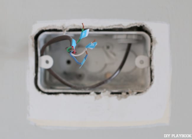 Remove the thermostat to begin installing your nest