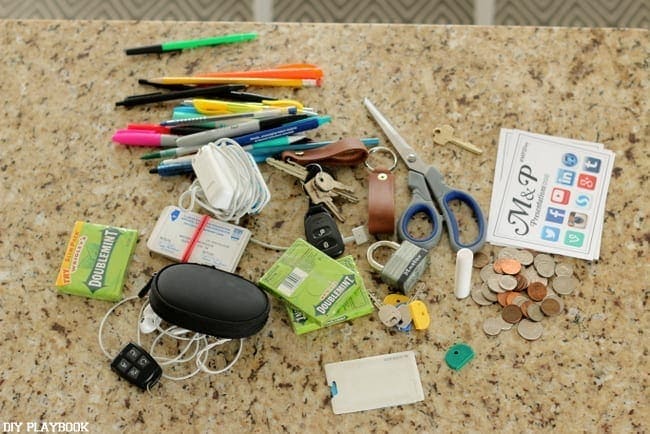 Start cleaning your junk drawer by going through every item. 