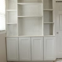 This built-in shelving unit is great or organization and looks chic.