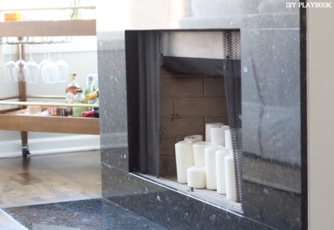 We love the look of the candles in the fireplace when we aren't using it