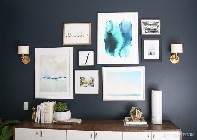 This guest room gallery wall is courtesy of Minted - don't these prints look great above the fauxdenza against the navy wall? 