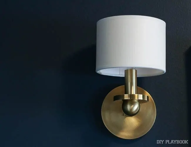 One of a pair of gorgeous new wall sconces in the guest room. Loving this gold color.