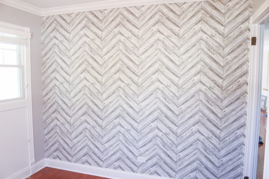 This new herringbone wallpaper looks great in the baby nursery. 
