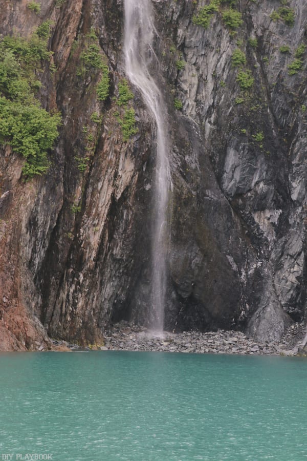 Make sure to visit the stunning waterfalls during your Alaskan trip. 