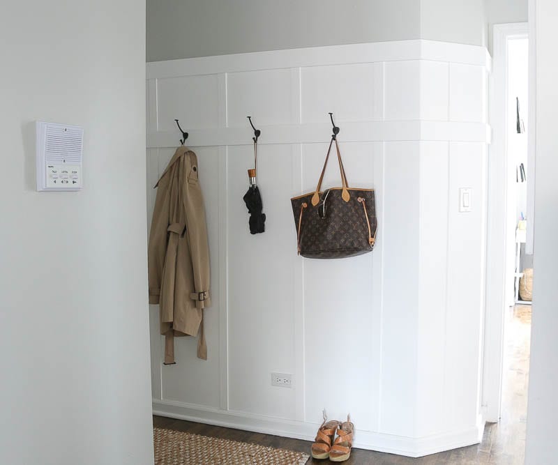 An open entryway with hooks is great for storage and keeping things clean. 