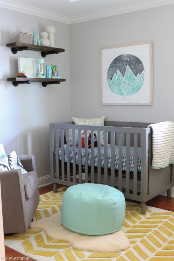 The pops of turquoise in this baby nursery are so cute.