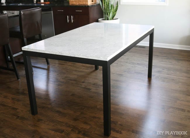 The new marble top table we chose for Casey's condo needs some chairs to go with it! Help us choose the dining room chair options!