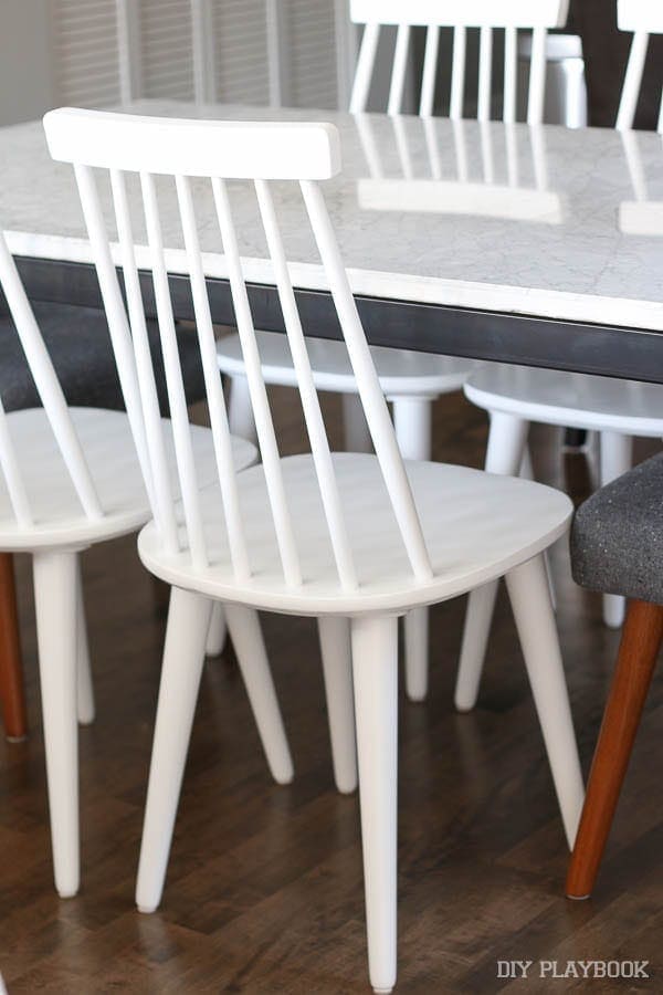 Detail shot of the white chairs around our marble table. 