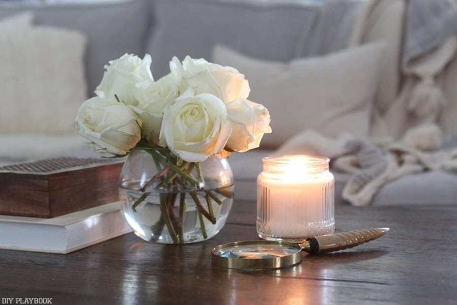 Lighting candles as one of the 7 ways to cozy up your home for fall is so calming and sets a relaxing mood.
