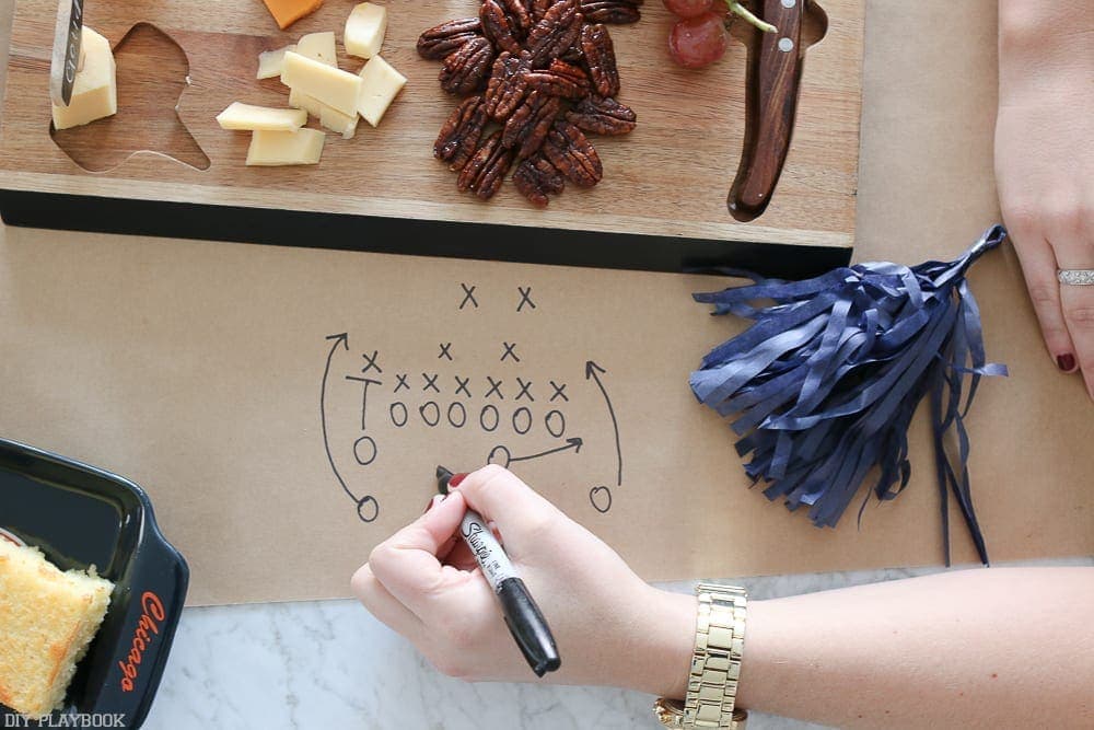 Here's one of Casey's football plays written out in a sharpie on the DIY table runner. 
