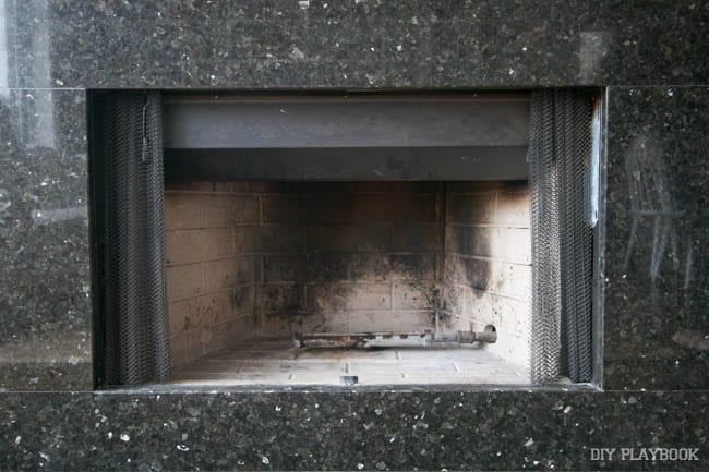 The dirty fireplace, before
