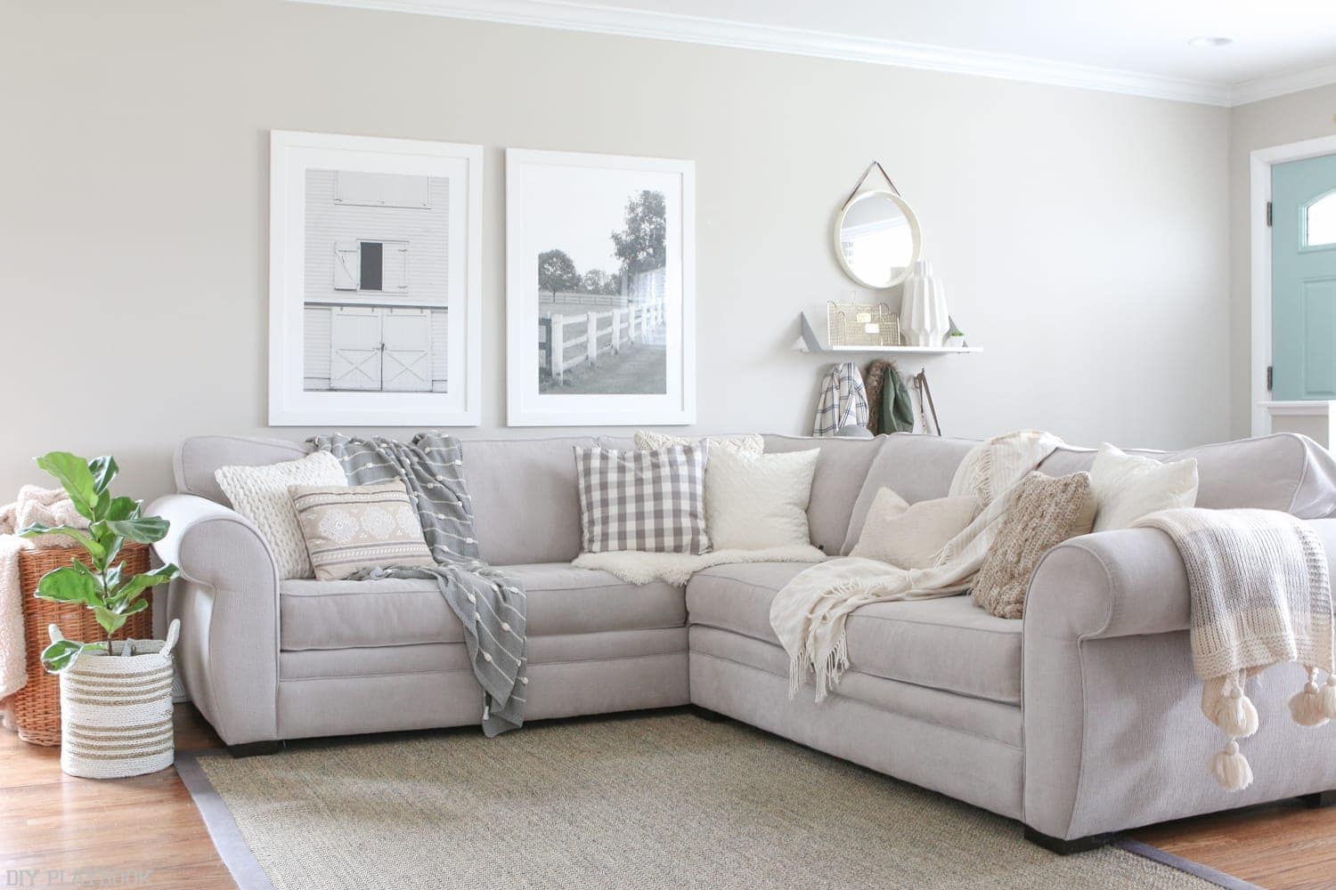 This minimalist style living room is the perfect balance of whites and grays. 